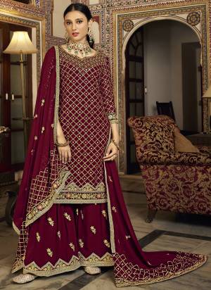 Attrective Looking These Sharara Suit in Fine Colored Pair With Bottom And Dupatta.These Top And Dupatta Are Fabricated On Chinon Pair With Chinon Bottom And  Santoon Inner.Its Beautified With Heavy Designer Embroidery Work.