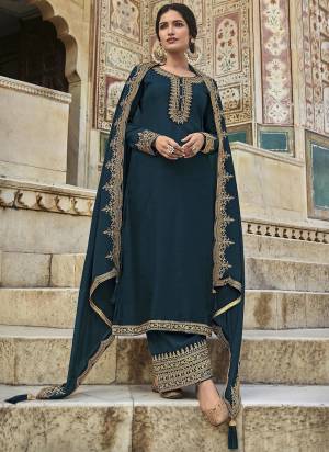 Attrective These Designer Plazzo Suit in Fine Colored Pair With Bottom And Dupatta.These Top Are Dola Silk And Dupatta Are Fabricated On Chinon Pair With Santoon Bottom.Its Beautified With Santoon Inner.Its Beautified With Designer Heavy Embroidery Work.