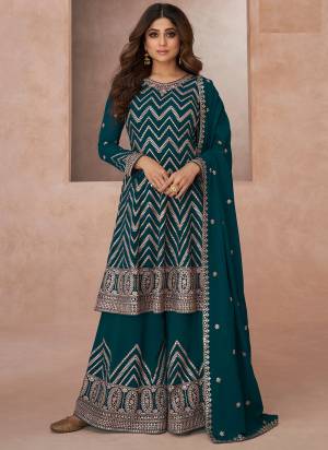 Garb These Designer Plazzo Suits in Fine Colored Pair With Dupatta.These Top And Dupatta Are Fabricated On Georgette Pair With Georgette Bottom.Its Beautified With Heavy Designer Floral Embroidery Work.