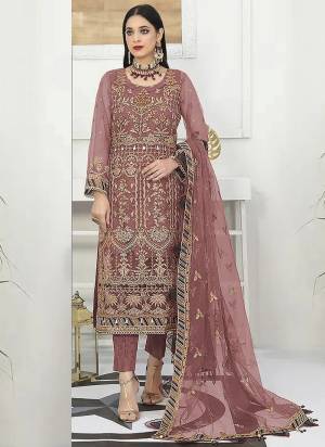 Attrective These Designer Suit in Fine Colored Pair With Bottom And Dupatta.These Top And Dupatta Are Fabricated On Net Pair With Santoon Bottom.Its Beautified With Santoon Inner.Its Beautified With Heavy Designer Embroidery Work.