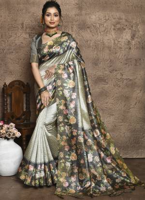 Attrective These Festive Wear Saree in Fine Colored.These Saree And Blouse is Fabricated On Tussar Silk.Its Beautified With Designer Flower Printed.