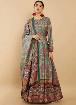 Grab These Partywear Anarkali Suit in Fine Colored Pair With Dupatta.These Suits Are Fabricated On Doll Silk Pair With Chinon Dupatta.Its Beautified With Designer Digital Printed With Hand Work In Nack Line.