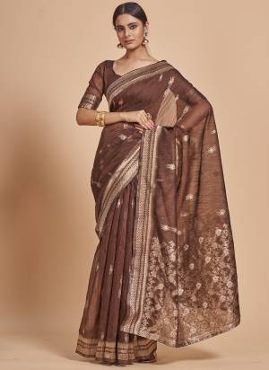 Garb This Partywear Saree Paired With Blouse In Fine Color.This Saree And Blouse Are Cotton Spun Based Fabric With Weaving Jacquard Designer With Sequance Work. Buy This Pretty Saree Now.