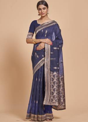 Garb This Partywear Saree Paired With Blouse In Fine Color.This Saree And Blouse Are Cotton Spun Based Fabric With Weaving Jacquard Designer With Sequance Work. Buy This Pretty Saree Now.