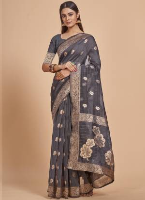 Garb This Partywear Saree Paired With Blouse In Fine Color.This Saree And Blouse Are Cotton Spun Based Fabric With Weaving Jacquard Designer With Sequance Work. Buy This Pretty Saree Now.