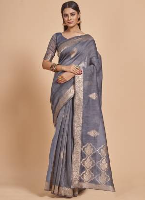 Garb This Partywear Saree Paired With Blouse In Fine Color.This Saree And Blouse Are Cotton Spun Based Fabric With Weaving Jacquard Designer With Sequance Work. Buy This Pretty Saree Now.