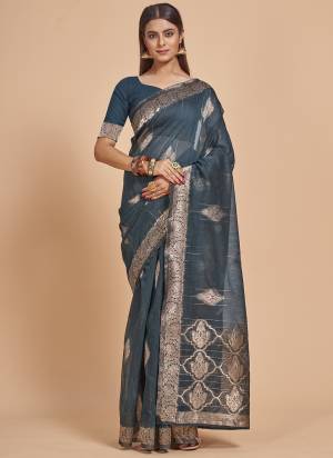 Garb This Partywear Saree Paired With Blouse In Fine Color.This Saree And Blouse Are Cotton Spun Based Fabric With Weaving Jacquard Designer With Sequance Work. Buy This Pretty Saree Now.