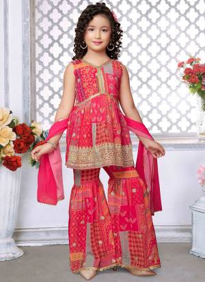 For A Designer Look,Grab These Kidswear Readymade Sharara Suits in Fine Colored.These Top And Bottom Are Fabricated On Faux Georgette Pair With Georgette Dupatta.Its Beautified With Designer Digital Printed,Jari Embroidery Work.