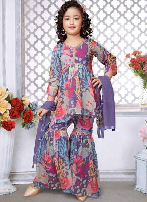 For A Designer Look,Grab These Kidswear Readymade Sharara Suits in Fine Colored.These Top And Bottom Are Fabricated On Faux Georgette Pair With Faux Georgette Dupatta.Its Beautified With Designer Floral Digital Printed.