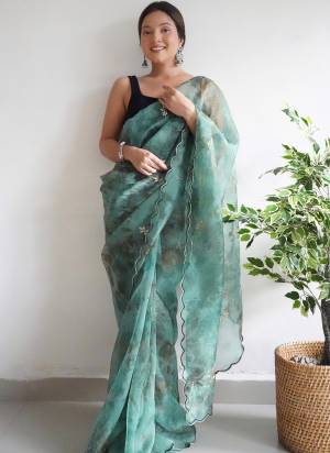 Attrective Looking These Party Wear Saree in Fine Colored.These Saree Are Organza And Blouse is Fabricated On Satin Banglori.Its Beautified With Digital Printed,Hand Work And Arco Cut Work.