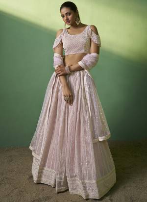 For A Designer Look,Grab These Lehenga Choli in Fine Colored.These Lehenga And Choli Are Fabricated On Georgette Pair With Net Dupatta.Its Beautified With Designer Sequance Embroidery Work.