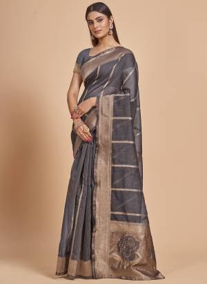 Garb This Partywear Saree Paired With Blouse In Fine Color.This Saree And Blouse Are Cotton Spun Based Fabric With Weaving Jacquard Designer With Sequance Work. Buy This Pretty Saree Now.