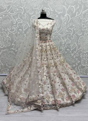 For A Fancy Designer Look,Grab These Lehenga Choli With Dupatta in Fine Colored.These Lehenga And Choli Are Net And Dupatta Are Fabricated On Soft Net Pair.Its Beautified With Designer Thread,Rainbow And 3D Sequance Embroidery Work.