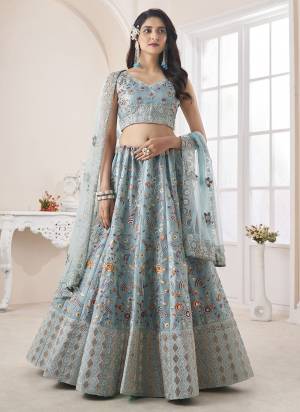 For A Designer Look,Grab These Lehenga Choli in Fine Colored.These Lehenga And Choli Are Fabricated On Art Silk Pair With Soft Net Dupatta.Its Beautified With Heavy Designer Embroidery Work.