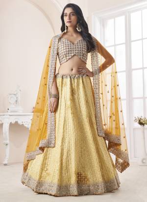 For A Designer Look,Grab These Lehenga Choli in Fine Colored.These Lehenga And Choli Are Fabricated On Georgette Pair With Soft Net Dupatta.Its Beautified With Heavy Designer Embroidery Work.