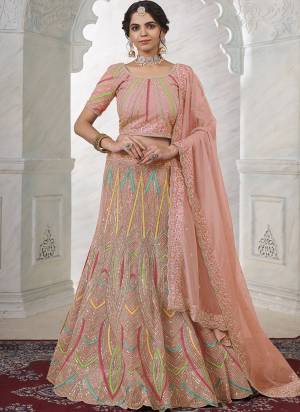 For A Designer Look,Grab These Lehenga Choli in Fine Colored.These Lehenga And Choli Are Fabricated On Soft Net Pair With Soft Net Dupatta.Its Beautified With Heavy Designer Embroidery Work.