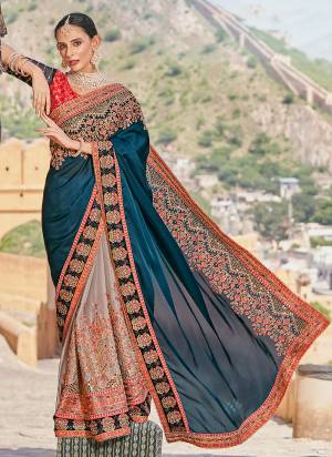 Garb These Designer Saree in Fine Colored.These Saree Are Fancy Fabric And Blouse is Fabricated On Art Silk Pair.Its Beautified Heavy Embroidery, Diamond Work.