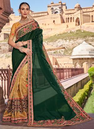 Garb These Designer Saree in Fine Colored.These Saree Are Fancy Fabric And Blouse is Fabricated On Art Silk Pair.Its Beautified Heavy Embroidery, Diamond Work.