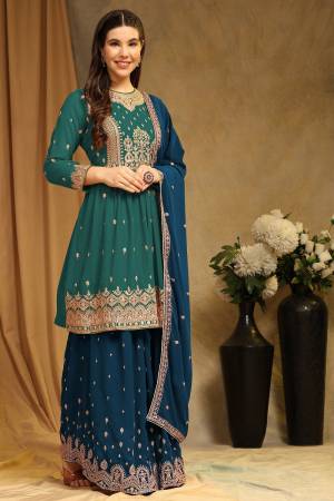 Attrective These Sharara Suit in Fine Colored Pair With Bottom And Dupatta.These Top Are Faux Georgette And Bottom Are Fabricated On Faux Georgette Pair With Faux Georgette Dupatta.Its Beautified With Santoon Inner.Its Beautified With Designer Embroidery Work.