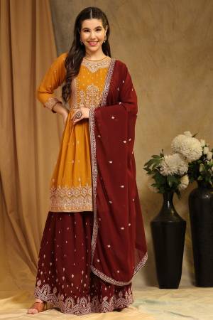 Attrective These Sharara Suit in Fine Colored Pair With Bottom And Dupatta.These Top Are Faux Georgette And Bottom Are Fabricated On Faux Georgette Pair With Faux Georgette Dupatta.Its Beautified With Santoon Inner.Its Beautified With Designer Embroidery Work.