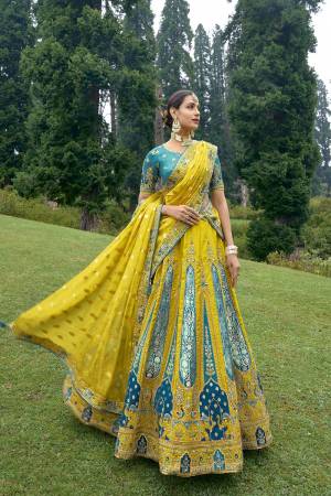 For A Designer Look,Grab These Designer Lehenga Choli in Fine Colored.These Lehenga And Blouse Are Fabricated On Silk Pair With Georgette Dupatta.Its Beautified With Heavy Designer Embroidery With Stone Work.