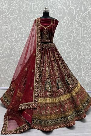 For A Fancy Designer Look,Grab These Lehenga Choli With Dupatta in Fine Colored.These Lehenga And Choli Are Velvet And Dupatta Are Fabricated On Soft Net Pair.Its Beautified With Heavy Designer Multy Thread Embroidery ,Diamond Work.