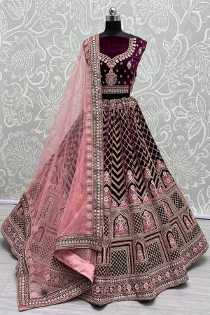 For A Fancy Designer Look,Grab These Lehenga Choli With Dupatta in Fine Colored.These Lehenga And Choli Are Velvet And Dupatta Are Fabricated On Soft Net Pair.Its Beautified With Heavy Designer Multy Thread Embroidery ,Diamond Work.