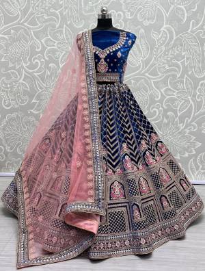 For A Fancy Designer Look,Grab These Lehenga Choli With Dupatta in Fine Colored.These Lehenga And Choli Are Velvet And Dupatta Are Fabricated On Soft Net Pair.Its Beautified With Heavy Designer Multy Thread Embroidery ,Diamond Work.