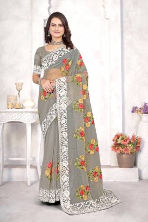 Garb This Party Wear Saree Are Fine Saree Paired With Blouse.This Saree And Blouse Are Organza Fabric With Designer Heavy Multy Thread Embroidery Work. Buy This Pretty Saree Now.