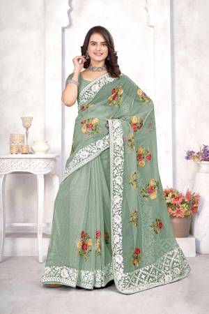 Garb This Party Wear Saree Are Fine Saree Paired With Blouse.This Saree And Blouse Are Organza Fabric With Designer Heavy Multy Thread Embroidery Work. Buy This Pretty Saree Now.