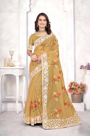 Garb This Party Wear Saree Are Fine Saree Paired With Blouse.This Saree And Blouse Are Organza Fabric With Designer Heavy Multy Thread Embroidery Work. Buy This Pretty Saree Now.