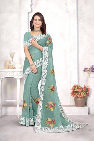 Garb This Party Wear Saree Are Fine Saree Paired With Blouse.This Saree And Blouse Are Organza Fabric With Designer Heavy Multy Thread Embroidery Work. Buy This Pretty Saree Now.