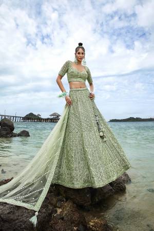 Attrective Looking This Partywear Fine Color Heavy Designer Choli Fabric Net And Lahenga Net And Dupatta Net In Fabricated Beautified With Attrective Thread,Sequance Embroidery Work. Buy Now.