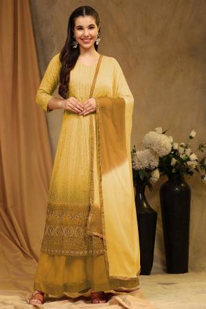 Attrective These Gharara Suit in Fine Colored Pair With Bottom And Dupatta.These Top Are Faux Georgette And Bottom Are Fabricated On Faux Georgette Pair With Nazmin Dupatta.Its Beautified With Santoon Inner.Its Beautified With Designer Sequance Embroidery Work.