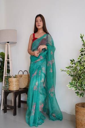 Attrective Looking These Party Wear Saree in Fine Colored.These Saree Are Organza And Blouse is Fabricated On Art Silk.Its Beautified With Designer Digital Printed,Sequance Aari Work Cut Work.