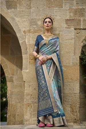 Looking These Party Wear Saree in Fine Colored.These Saree And Blouse is Fabricated On V P Silk.Its Beautified With Weaving Jari Designer With Aqua Finished.