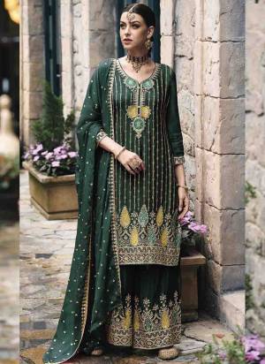 Attrective These Plazzo Suit in Fine Colored Pair With Bottom And Dupatta.These Top And Dupatta Are Fabricated On Chonon Silk Pair With Chinon Silk Bottom.Its Beautified With Dull Santoon Inner.Its Beautified With Heavy Designer Embroidery Work.