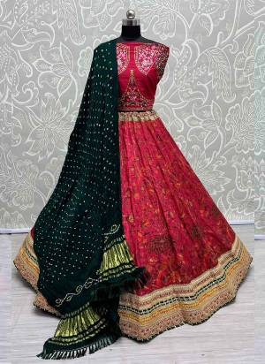 For A Fancy Designer Look,Grab These Lehenga Choli With Dupatta in Fine Colored.These Lehenga And Choli Are Silk And Dupatta Are Fabricated On Bandhani Pair.Its Beautified With Designer Printed, Embroidery Work Lace.