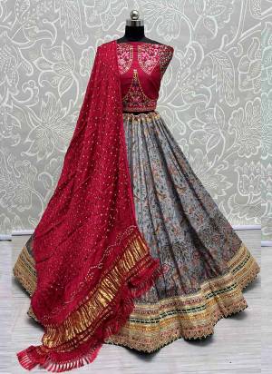 For A Fancy Designer Look,Grab These Lehenga Choli With Dupatta in Fine Colored.These Lehenga And Choli Are Silk And Dupatta Are Fabricated On Bandhani Pair.Its Beautified With Designer Printed, Embroidery Work Lace.