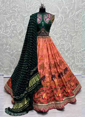 For A Fancy Designer Look,Grab These Lehenga Choli With Dupatta in Fine Colored.These Lehenga And Choli Are Silk And Dupatta Are Fabricated On Bandhani Pair.Its Beautified With Designer Printed, Embroidery Work Lace.