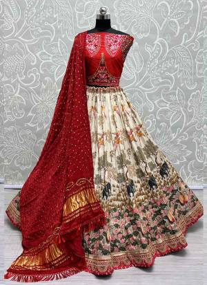 For A Fancy Designer Look,Grab These Lehenga Choli With Dupatta in Fine Colored.These Lehenga And Choli Are Silk And Dupatta Are Fabricated On Bandhani Pair.Its Beautified With Designer Printed, Embroidery Work Lace.