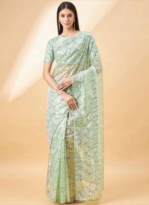 Look Attrective These Designer Party Wear Saree in Fine Colored.These Saree Are Georgette And Blouse is Fabricated On Art Silk Blend.Its Beautified With Designer Sequance Embroidery Work.