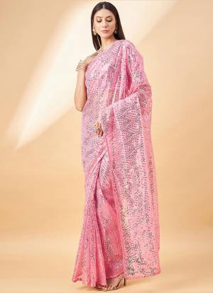 Look Attrective These Designer Party Wear Saree in Fine Colored.These Saree Are Georgette And Blouse is Fabricated On Art Silk Blend.Its Beautified With Designer Sequance Embroidery Work.