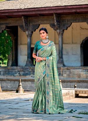 Looking These Party Wear Designer Saree in Fine Colored.These Saree Are Banarasi Silk And Blouse is Fabricated On Raw Silk.Its Beautified With Wevon Designer With Sequance,Jari,Thread Embroidery Work.