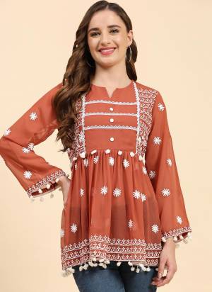 Grab These Beautiful Looking Readymade Short Kurti.These Kurti is Fabricated On Georgette.Its Beautified With Designer Embroidery Work.