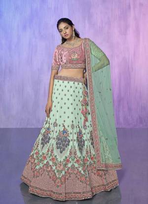 For A Designer Look,Grab These Lehenga Choli in Fine Colored.These Lehenga Are Georgette And Choli Are Fabricated On Velvet Pair With Soft Net Dupatta.Its Beautified With Heavy Designer Embroidery Work.