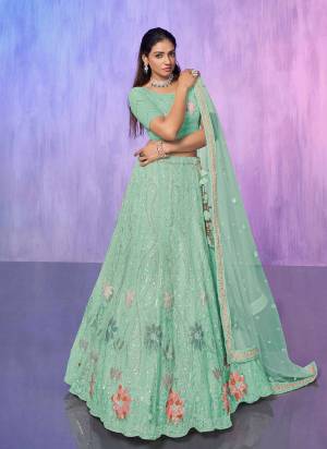 For A Designer Look,Grab These Lehenga Choli in Fine Colored.These Lehenga And Choli Are Fabricated On Net Pair With Soft Net Dupatta.Its Beautified With Heavy Designer Embroidery Work.