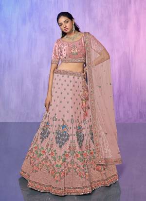 For A Designer Look,Grab These Lehenga Choli in Fine Colored.These Lehenga Are Georgette And Choli Are Fabricated On Velvet Pair With Soft Net Dupatta.Its Beautified With Heavy Designer Embroidery Work.