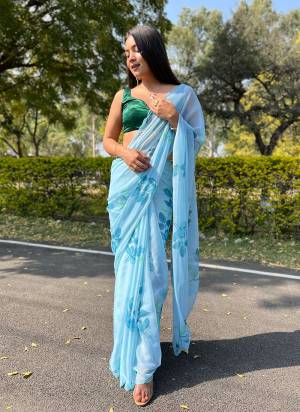 Garb These Party Wear Saree in Fine Colored.These Saree Are Chiffon And Blouse is Fabricated On Satin Chiffon.Its Beautified With Digital Foil Printed,Cut Work.