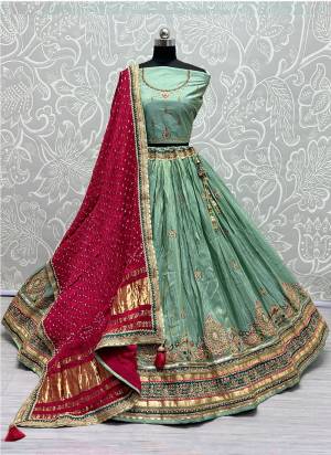 For A Fancy Designer Look,Grab These Lehenga Choli With  Dupatta in Fine Colored.These Lehenga And Choli Dolla Silk And Dupatta Are Fabricated On Gajji Silk.Its Beautified With Designer Sequance,Jari Embroidery,Zarkan Diamond Work.